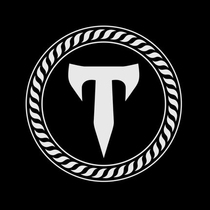 Titans Shield Elite logo: flagship silver T shield emblem framed by a tactical rope circle on a blackout field.