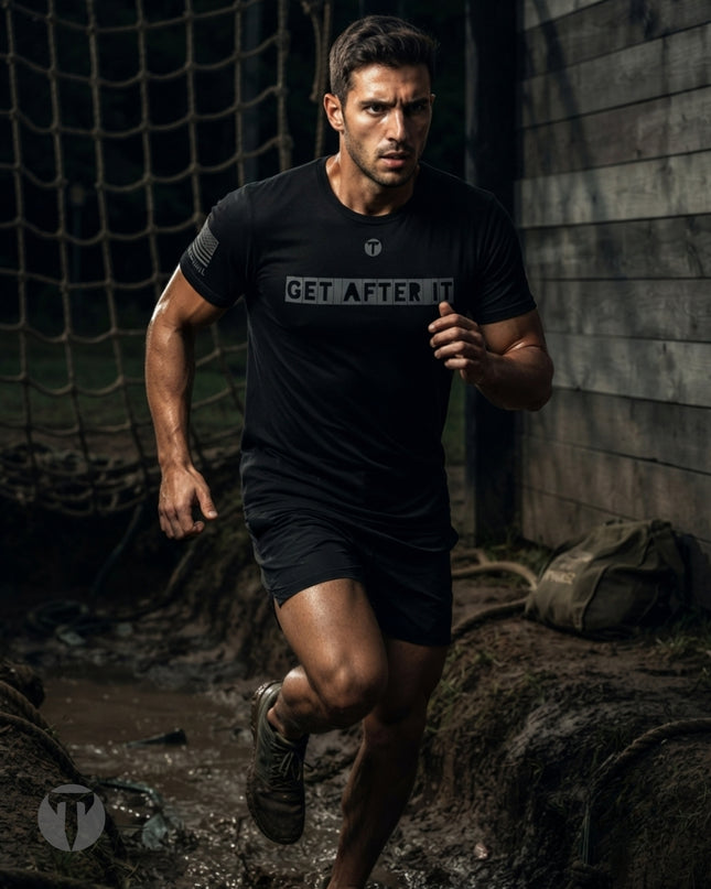 A muscular man running outdoors wearing a black Titan 6 Endure T-shirt with 'GET AFTER IT' printed across the chest and black shorts.