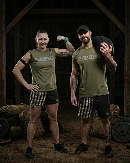 Titan 6 Actual Get After It graphic tee worn with camo workout shorts in rustic barn training environment.