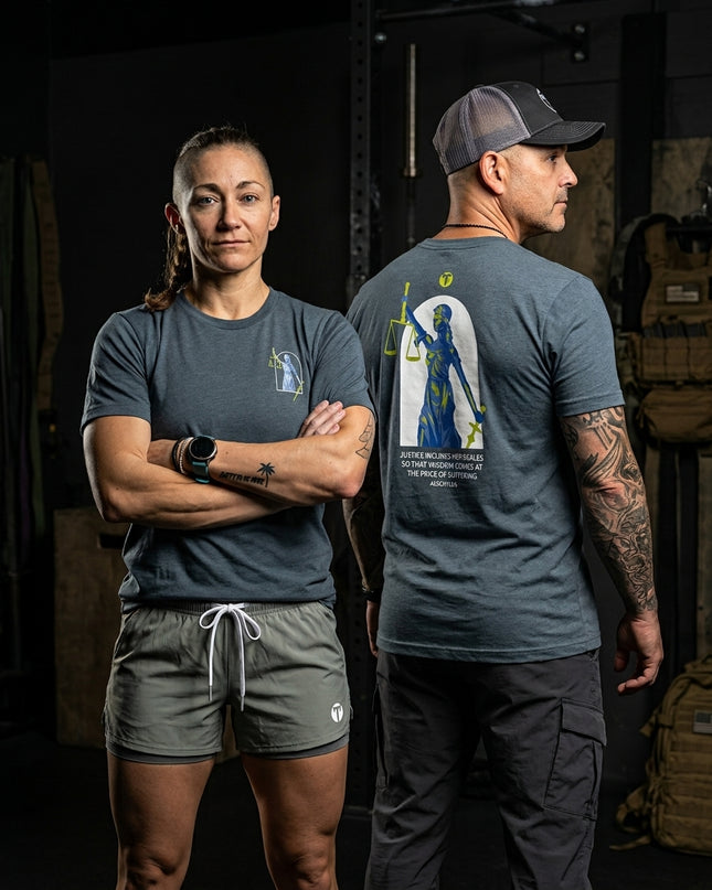 Titan 6 Lady Justice dark heather grey graphic shirt worn during gym training