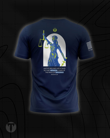 Back view of the Titan 6 Men's Endure T-Shirt in navy blue, featuring a large graphic of Lady Justice holding scales and a sword above an Aeschylus quote: "JUSTICE INCLINES HER SCALES SO THAT WISDOM COMES AT THE PRICE OF SUFFERING."