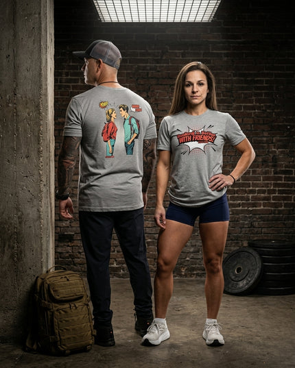 Titan 6 Actual Rucking Is Better With Friends graphic tee worn with dark trousers and athletic shorts in a gym environment.  