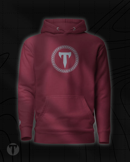 Titan 6 Unisex Citadel Pullover Hoodie in Maroon, featuring a grey circular "T" logo centered on the chest, complete with a kangaroo front pocket and drawstrings.