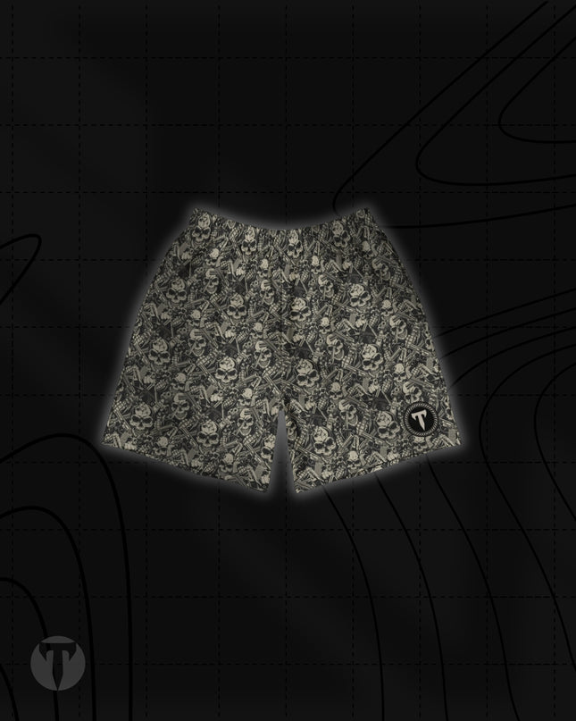 Front view of the Titan 6 Unisex Endure 6-Inch Linerless Shorts featuring a monochrome Outlaw skull and weapon pattern with the dark Elite logo on the left leg hem.