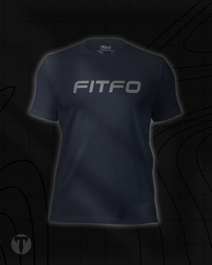 Titan 6 Unisex Nomad Tee in Heather Navy, featuring "FITFO" printed across the chest in bold, silver italicized lettering.