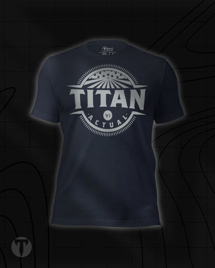 Titan 6 Unisex Nomad Tee in Heather Navy, featuring a retro circular "TITAN 6 ACTUAL" emblem centered on the chest with stars and rays design.