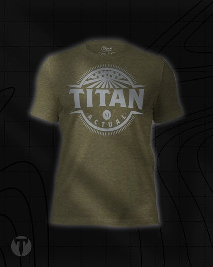 Titan 6 Unisex Nomad Tee in Heather Olive, featuring a retro circular "TITAN 6 ACTUAL" emblem centered on the chest with stars and rays design.