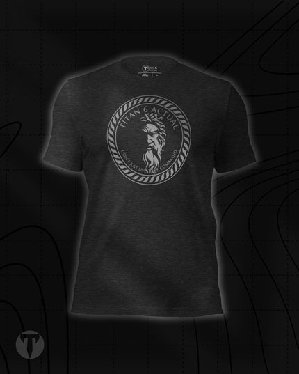 Titan 6 Unisex Nomad Tee in Dark Grey Heather, featuring a circular silver Zeus emblem centered on the chest.