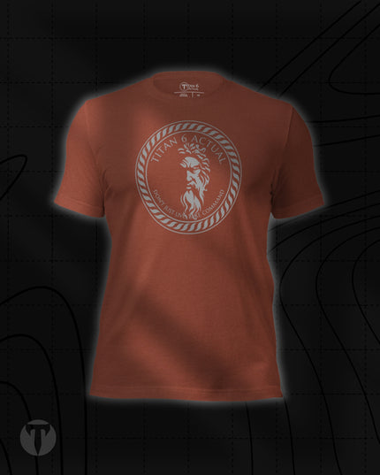Titan 6 Unisex Nomad Tee in Heather Clay, featuring a circular Zeus logo centered on the chest.