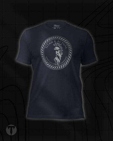 Titan 6 Unisex Nomad Tee in Heather Navy, featuring a circular silver Zeus emblem centered on the chest.