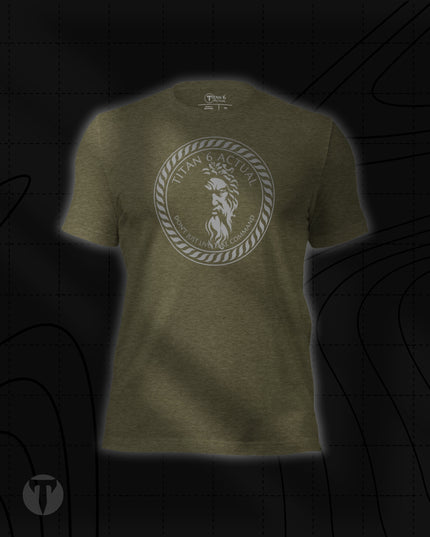 Titan 6 Unisex Nomad Tee in Heather Olive, featuring a circular silver Zeus emblem centered on the chest.