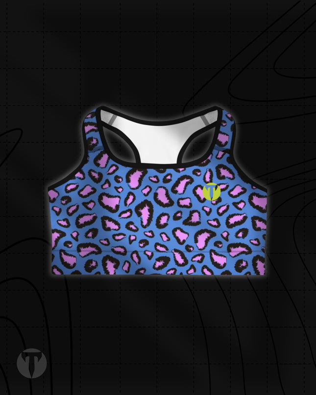 Titan 6 Women's Glide Sports Bra in Electric Leopard, featuring a vibrant royal blue and pink leopard animal print with a yellow "T" logo on the left chest.
