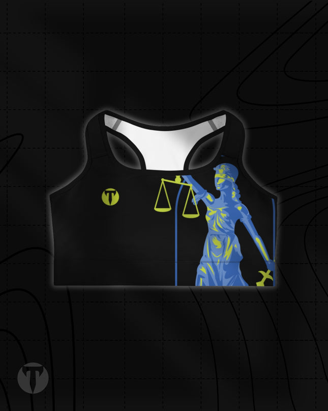 Women's Glide Sports Bra in black by Titan 6, featuring a blue and chartreuse Lady Justice graphic with scales of justice and yellow logo detail.